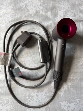 Dyson Hair Dryer in Iron with Fuchsia Accent